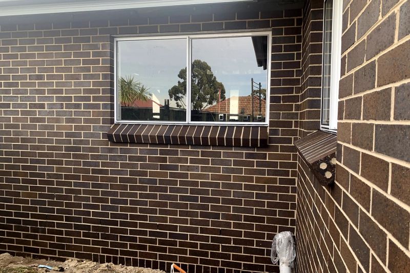 Face brick exterior and aluminium window of a recently completed granny flat