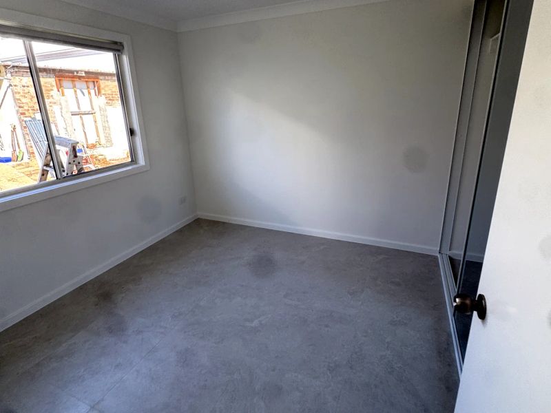 Finished bedroom in the completed granny flat