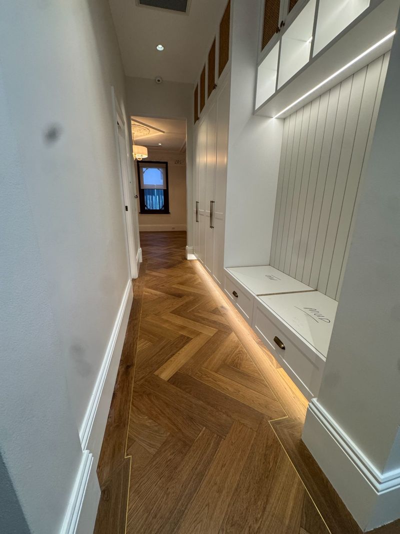 Renovated room with finished flooring and fixtures