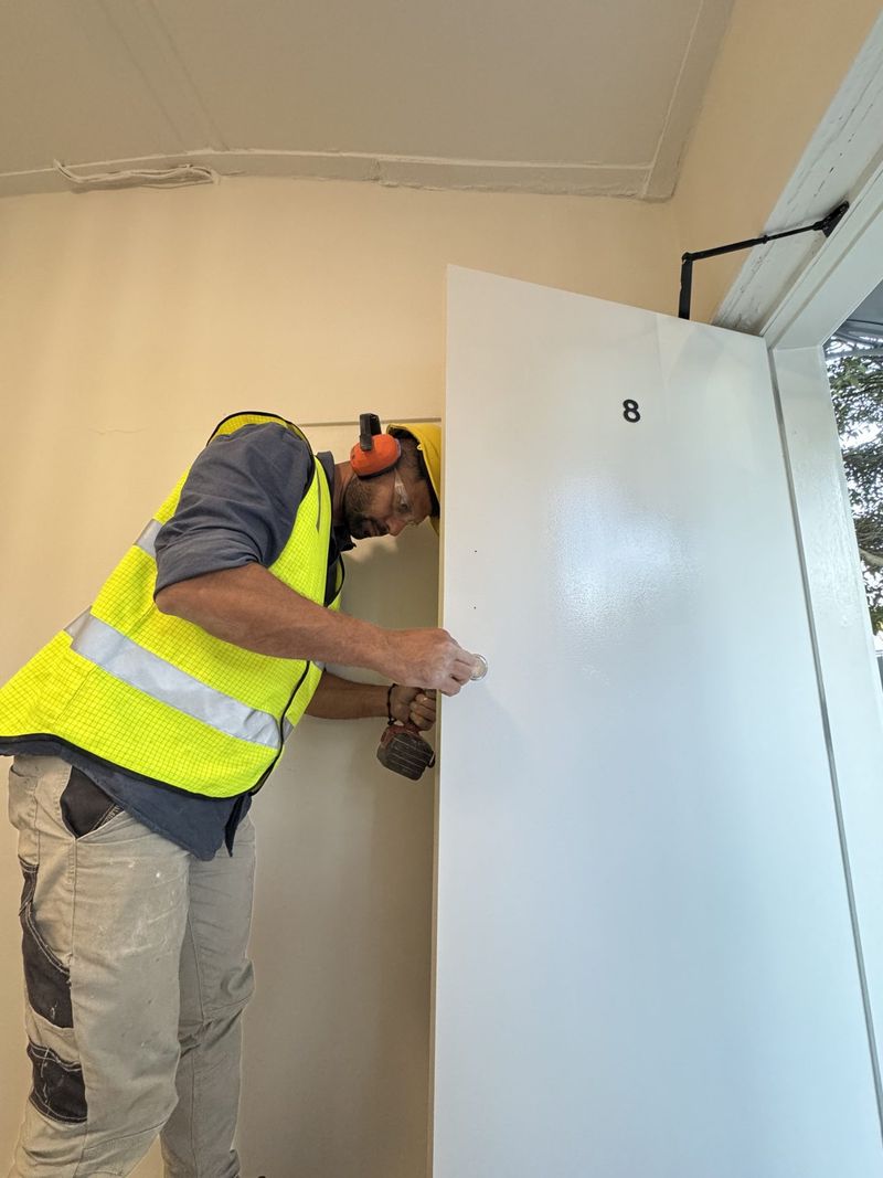 Fitting a new internal door during a renovation.