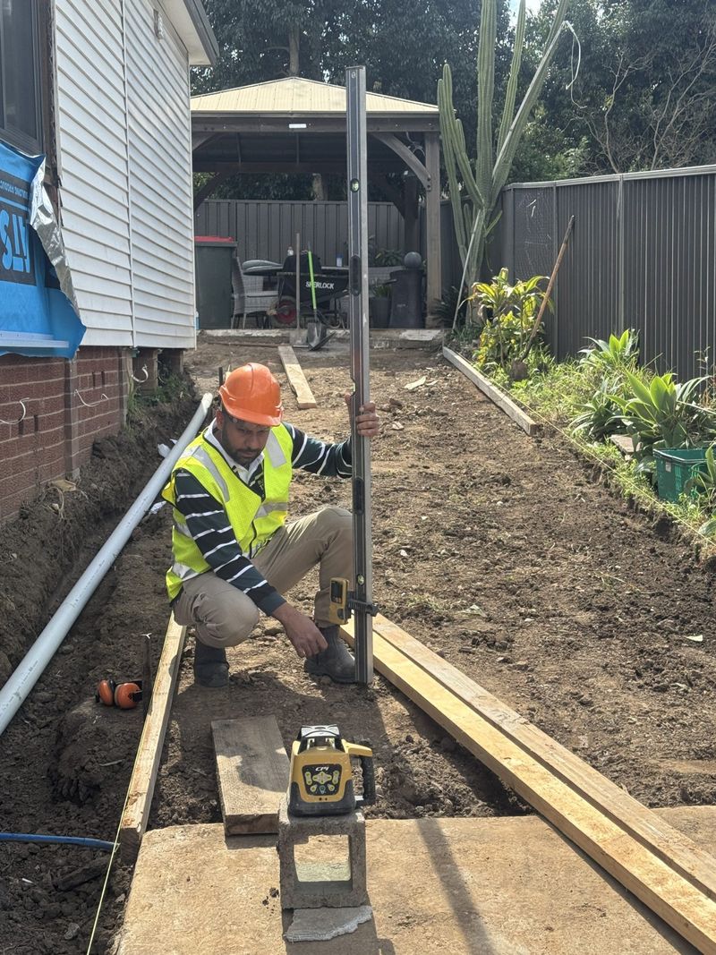 Setting out a new fence line with a string line.