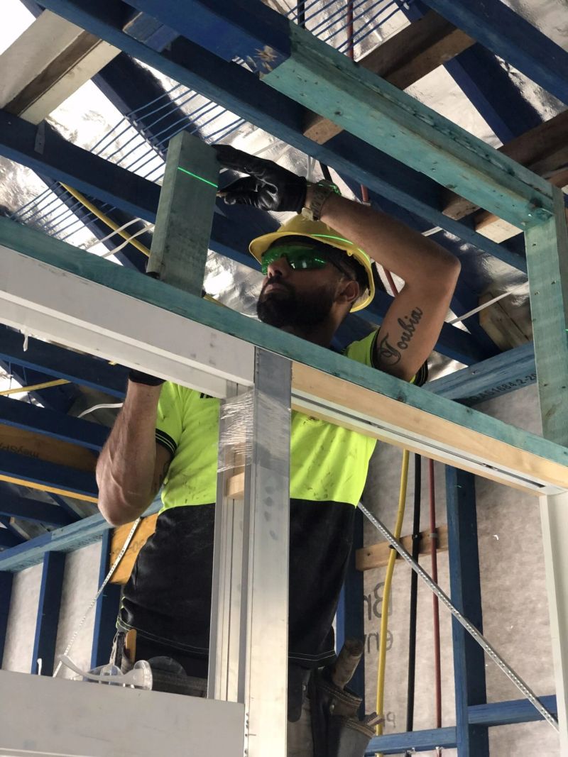 Fixing roof rafters into place during construction.