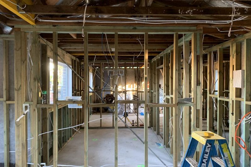 Timber wall frames standing on the granny flat slab