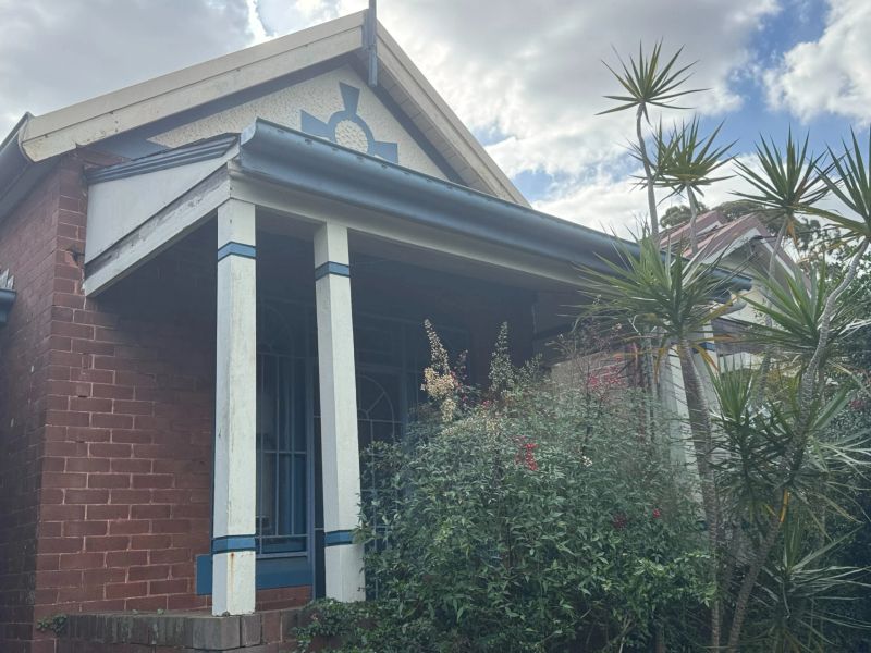 Federation-style verandah with cast detail and timber columns on an Inner West Sydney home