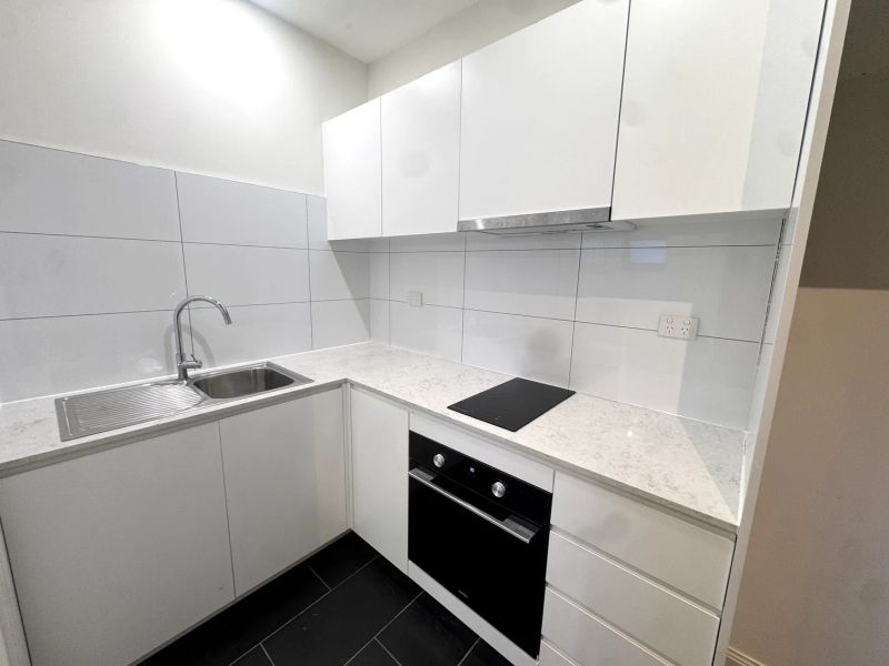 Compact kitchenette fitted out in the finished granny flat